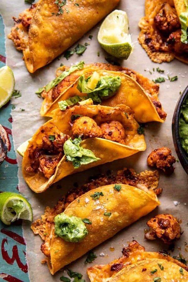Crispy cauliflower tinga tacos with honey lime avocado crema