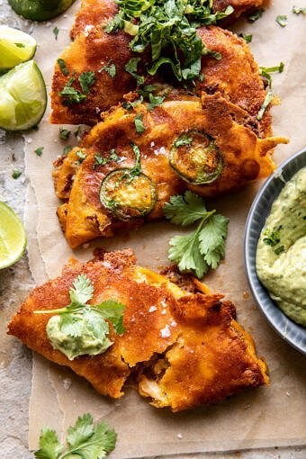 Crispy cheese chicken tacos with avocado cilantro sauce