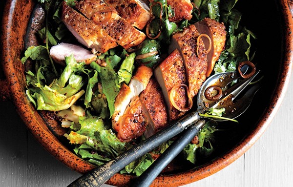 Crispy chicken breasts with chermoula and escarole