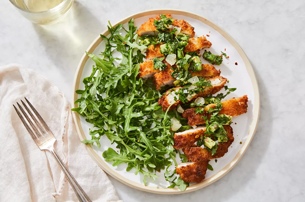 Crispy chicken cutlets with lemon-avocado relish & garlicky greens