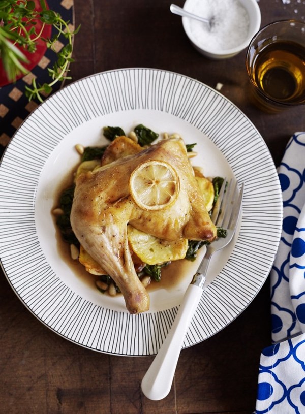 Crispy chicken on potatoes with balsamic spinach
