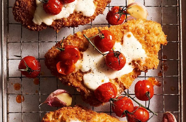 Crispy chicken Parmigiana with roast cherry tomatoes 