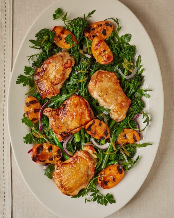 Crispy chicken thighs with charred broccoli, apricots and preserved lemon dressing 