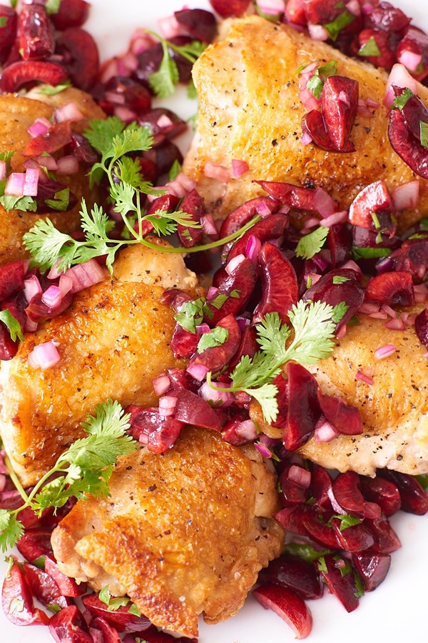 Crispy chicken thighs with fresh cherry salsa