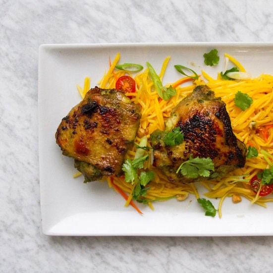 Crispy chicken thighs with green papaya salad