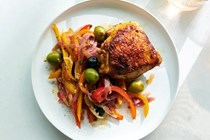 Crispy chicken thighs with peppers, capers and olives