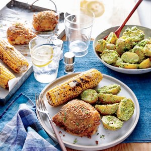 Crispy chicken thighs with spinach-and-pea potato salad