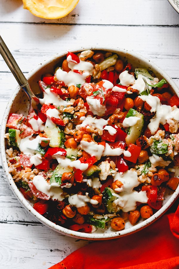 Crispy chickpea and farro tabbouleh bowls with feta and tahini-yogurt sauce