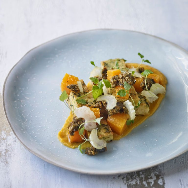 Crispy chickpea cakes, roasted butternut squash, harissa and pumpkin seed mole, pickled celery