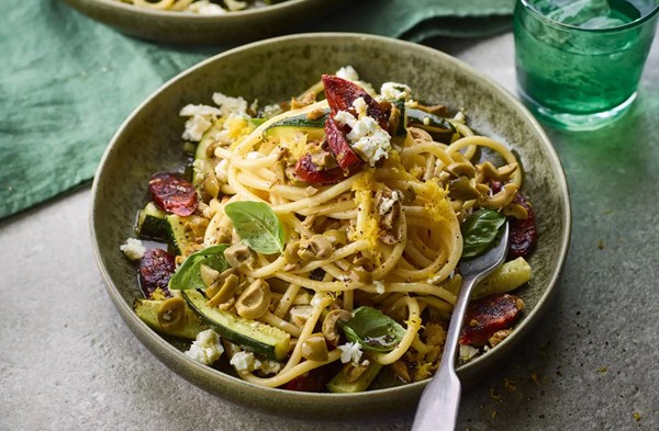 Crispy 'chorizo', olive & courgette bucatini with lemon and feta