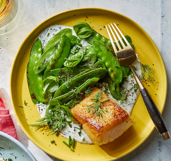 Crispy cod with snow peas & herb sauce