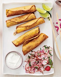Crispy corn tortillas with chicken and cheddar