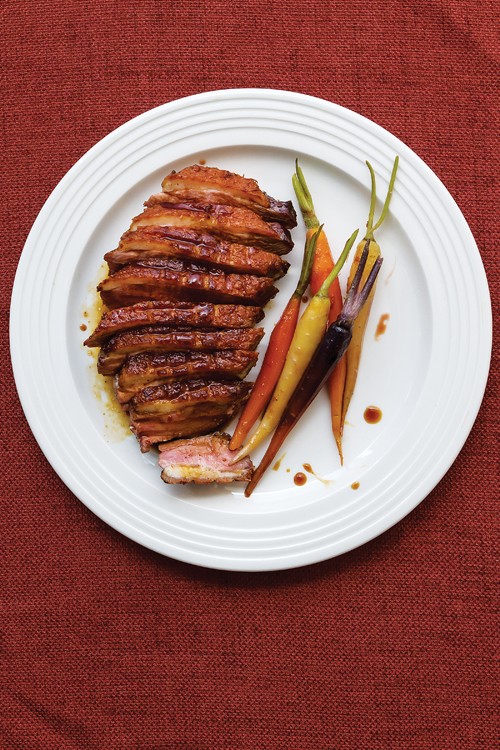 Crispy duck breasts with glazed carrots