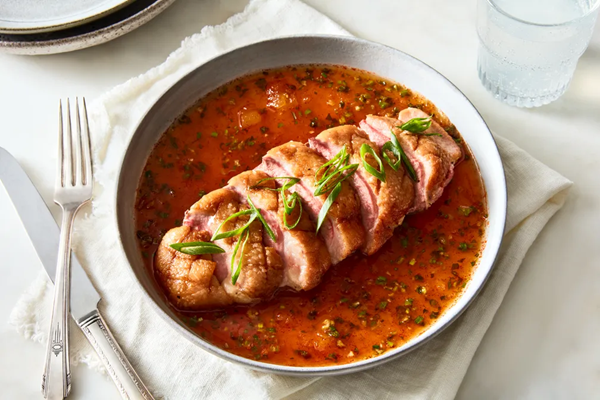 Crispy duck breasts with pineapple-scallion sauce
