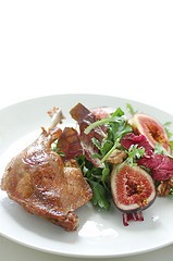 Crispy duck confit with fig and walnut salad