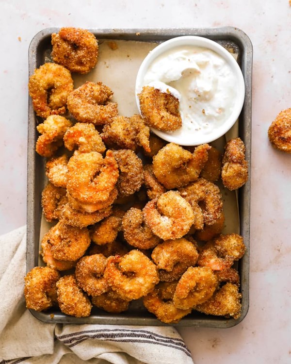 Crispy fonio fried shrimp with ginger-lime yogurt sauce 