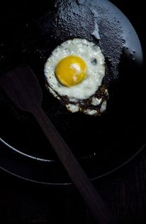 Crispy fried eggs in ghee