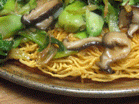 Crispy fried noodle nest with mushrooms and bok choy (Suhui liangmian huang / 素燴兩面黃)