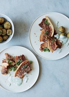 Crispy fried pork slices with parsley sauce (Stegt flæsk med persillesovs)