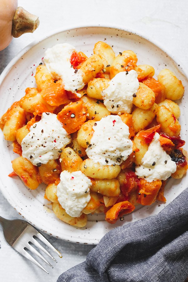 Crispy gnocchi with roasted honeynut squash, cherry tomatoes, and ricotta