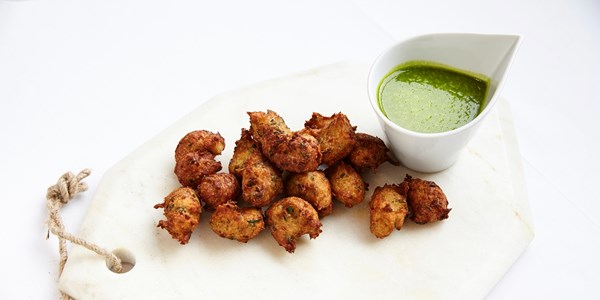 Crispy haddock doughnuts with lettuce and chilli oil sauce