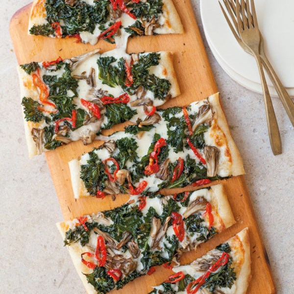 Crispy kale, mushroom, and peppadew pizza