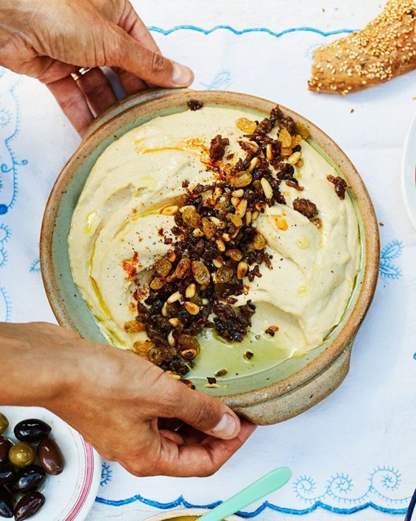 Crispy lamb, pine nut and raisin-topped houmous 