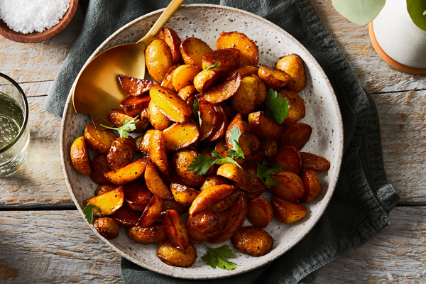 Crispy lemon-saffron potatoes with black peppercorns