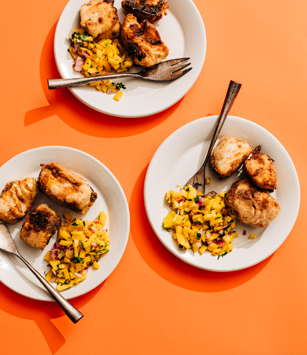 Crispy marinated pan-fried fish and mango slaw