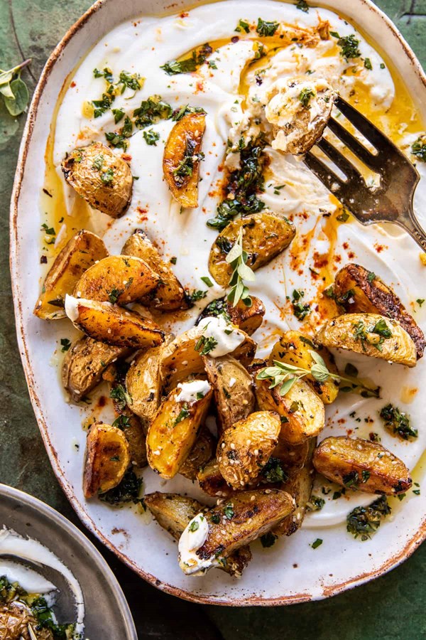 Crispy oregano roasted potatoes with creamy feta sauce