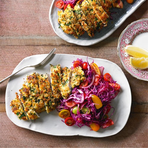 Crispy Parmesan chicken with tomato salad