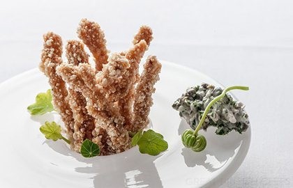 Crispy pig's ears with nasturtium and caper tartare sauce