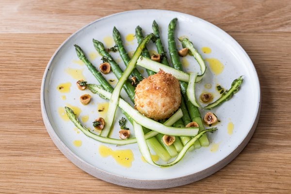  Crispy poached egg, asparagus, roasted hazelnut and lemon thyme dressing