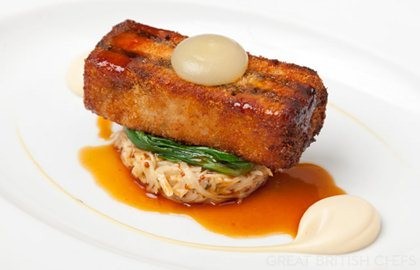 Crispy pork belly with black pudding, celeriac remoulade and apple purée