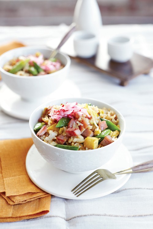 Crispy pork fried rice with pickled radishes