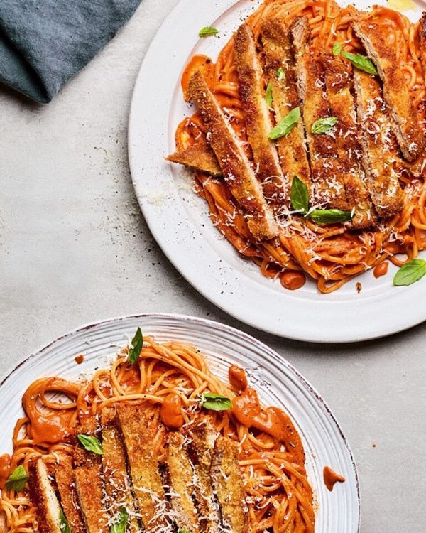 Crispy pork schnitzels with spaghetti alla vodka