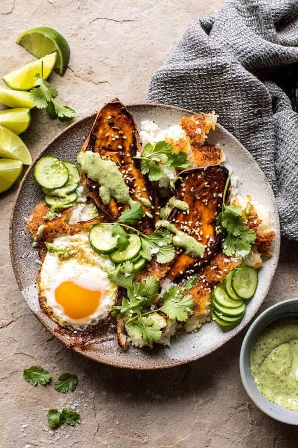 Crispy rice bowl with browned butter sweet potatoes and herby green tahini
