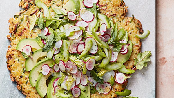 Crispy rice cake with celery salad and avocado