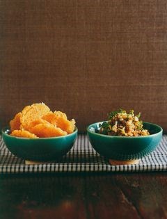 Crispy rice cakes with chilli pork sauce
