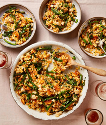 Crispy rice salad with beans and pork scratchings