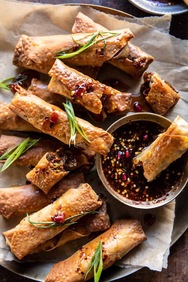 Crispy sesame ginger egg rolls with sweet chili sauce
