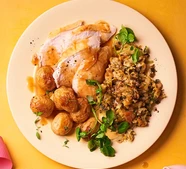 Crispy-skinned chicken with roast Jersey Royals & watercress stuffing