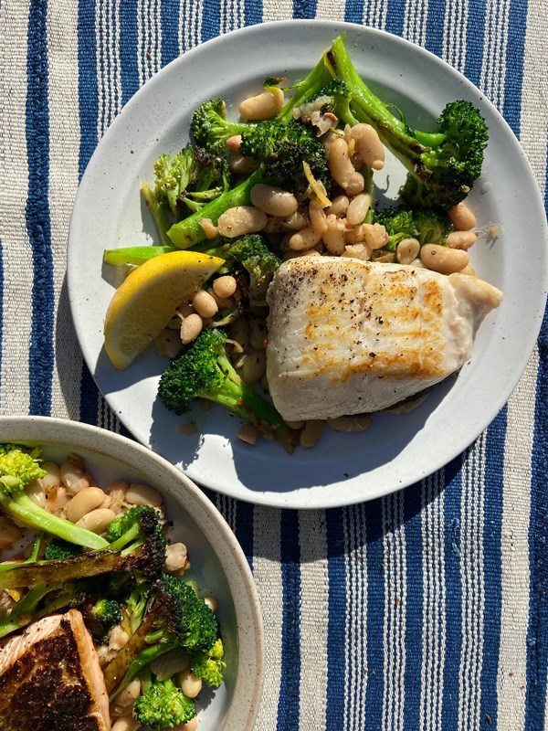 Crispy-skinned fish with smashed white beans