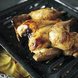 Crispy-skinned high-roast butterflied chicken with potatoes