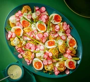 Crispy smashed new potatoes with asparagus, jammy eggs & pickled radish