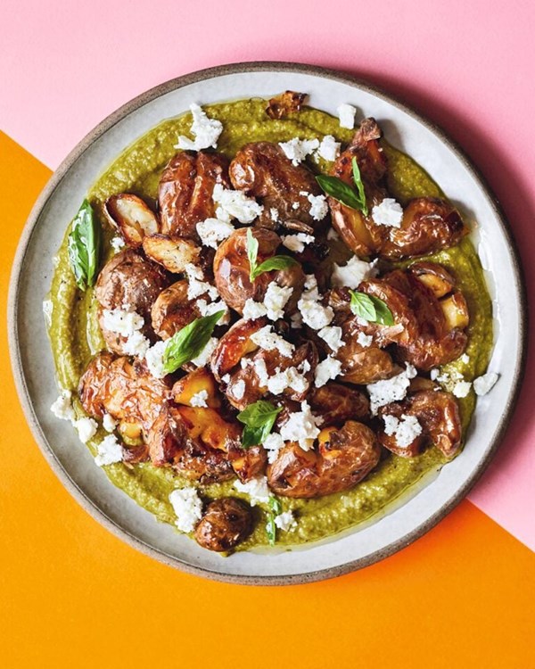 Crispy smashed potatoes with green romesco 