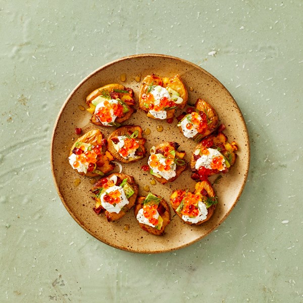 Crispy smashed potatoes with salmon caviar 