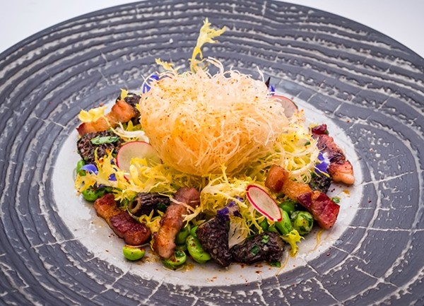 Crispy soft-poached egg served with broad bean salad and smoked bacon 