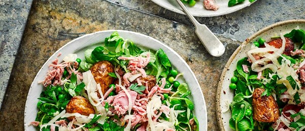 Crispy spud salad with sauerkraut, ham hock and peas