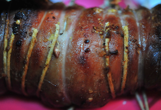 Crispy stuffed lamb belly with blood orange sauce